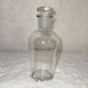 Apothecary glass jar.